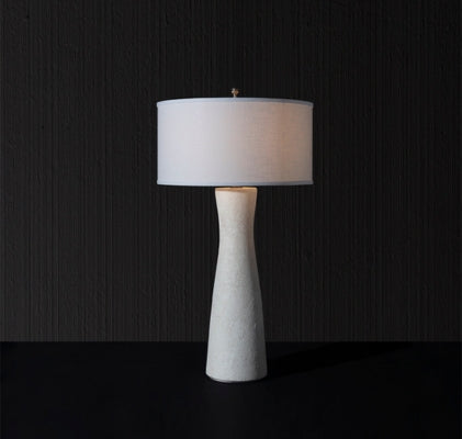 Handcrafted ceramic table lamp featured in artisan lighting collection