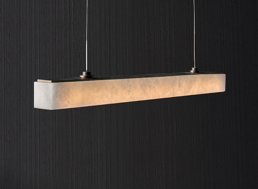 Handcrafted linear pendant light featured in artisan lighting collection