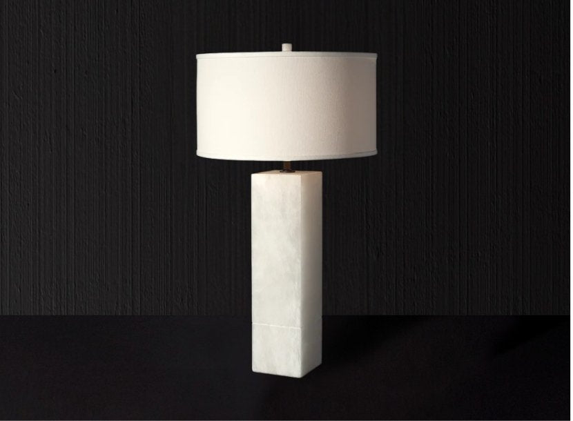 A luxury white table lamp with a matching shade from the Alabaster Collection, designed for elegant home lighting.