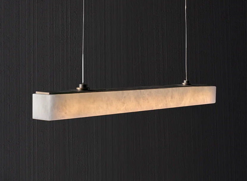 Luxury alabaster linear pendant light with warm diffused glow, ideal for modern Dallas interiors.