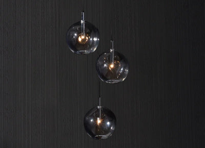 Italian crystal globe pendant cluster with warm illumination and elegant modern design
