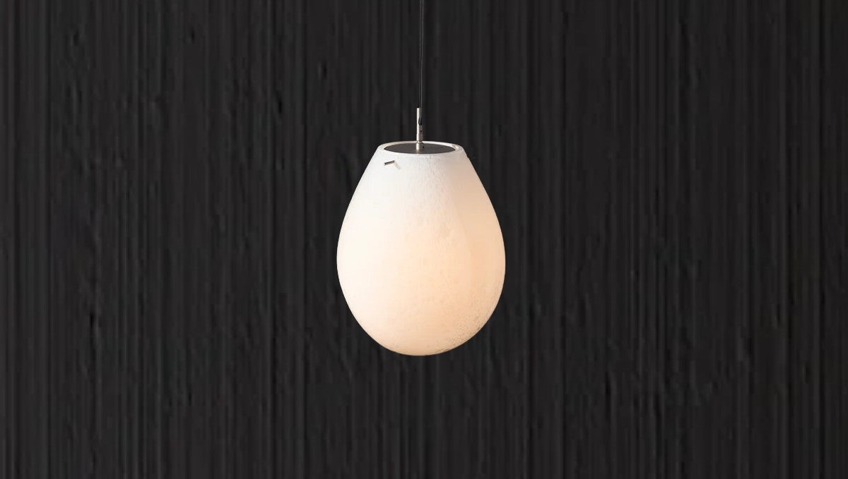 Minimalist oval pendant light with soft glow for modern interior lighting by RENGCO
