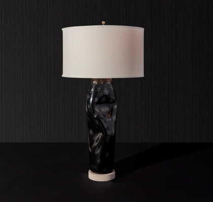 Elegant black and white lamp with a white shade, crafted by Artisan Lighting Company.