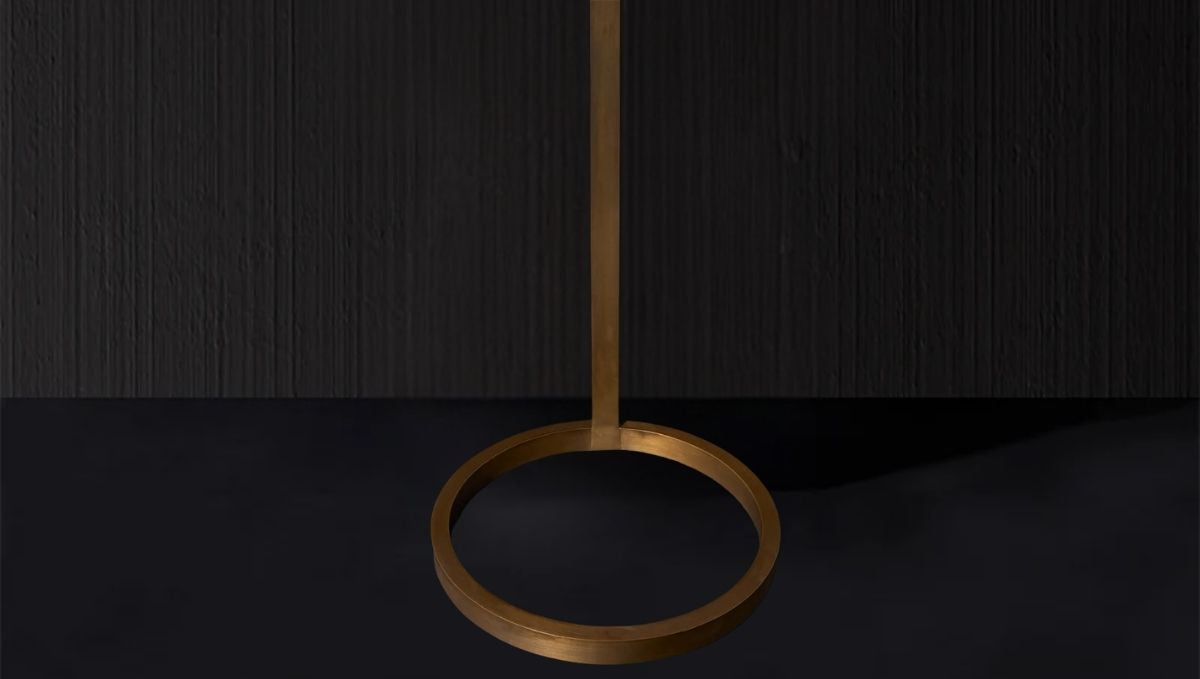 Modern artistic floor lamp with circular brass base design