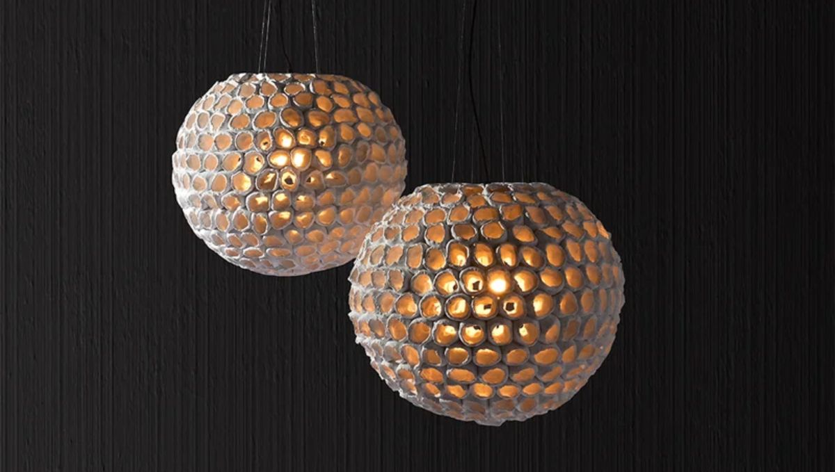 Artistic light fixtures with two glowing sculptural pendant lights in a timeless design