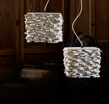 Handmade woven pendant lights creating warm ambient lighting