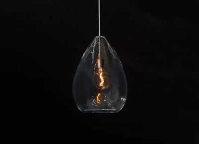 Elegant glass pendant light with an internal bulb, showcasing the Luxury Home Custom Lighting Crystal Collection.