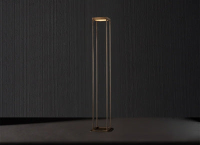 A modern floor lamp from the Luxury Home Custom Lighting Metal Collection, set against a sleek black background.