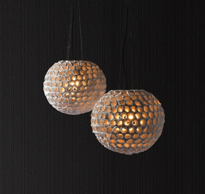 Luxury mosaic glass pendant lights with warm ambient glow, perfect for sophisticated Dallas interiors.